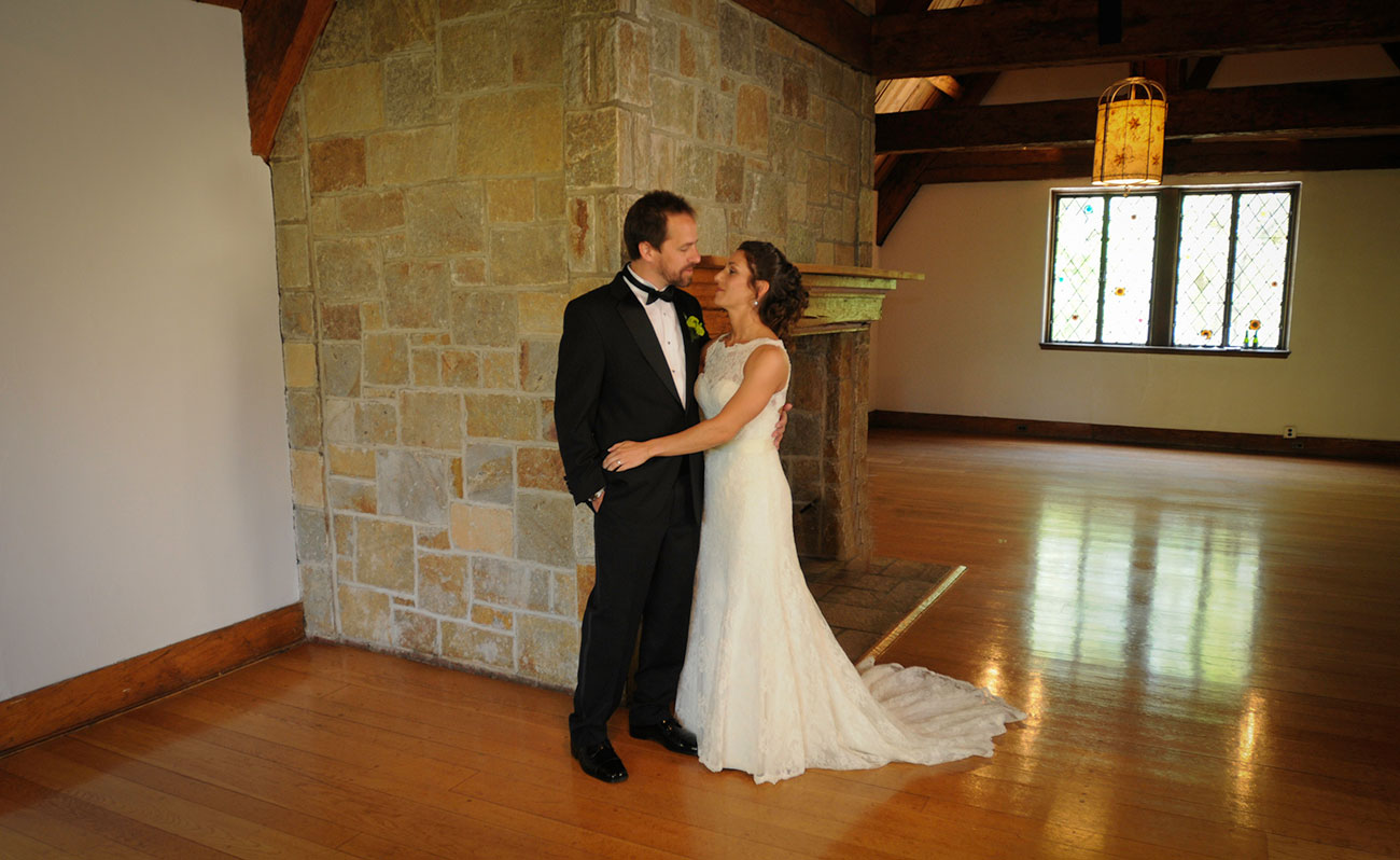 Couple by the Antiques Room Fireplace